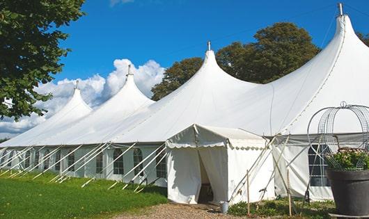 high-quality portable restrooms stationed at a wedding, meeting the needs of guests throughout the outdoor reception in Andover